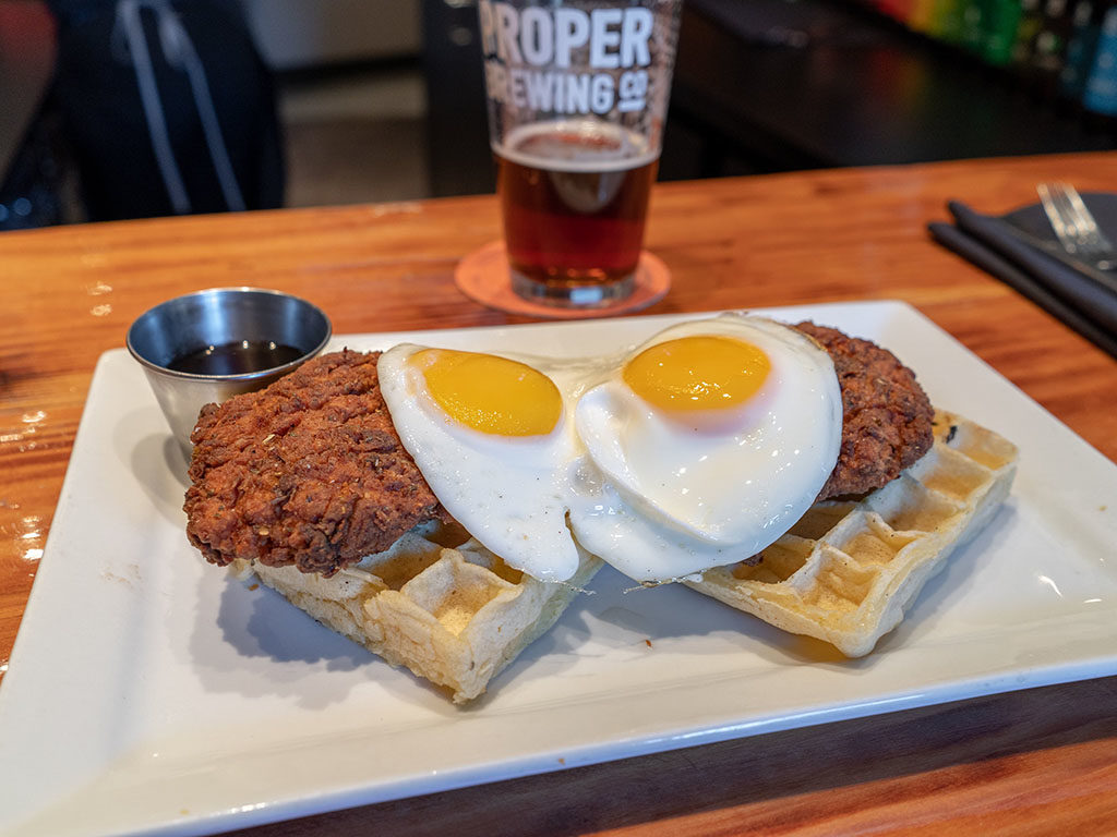 Avenues Proper - chicken and waffles at the bar