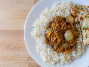 Bahnsa Ghar - chicken dopiaza with garlic naan