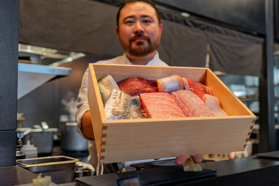 Chef Ben Steigers with fresh fish at Wisteria