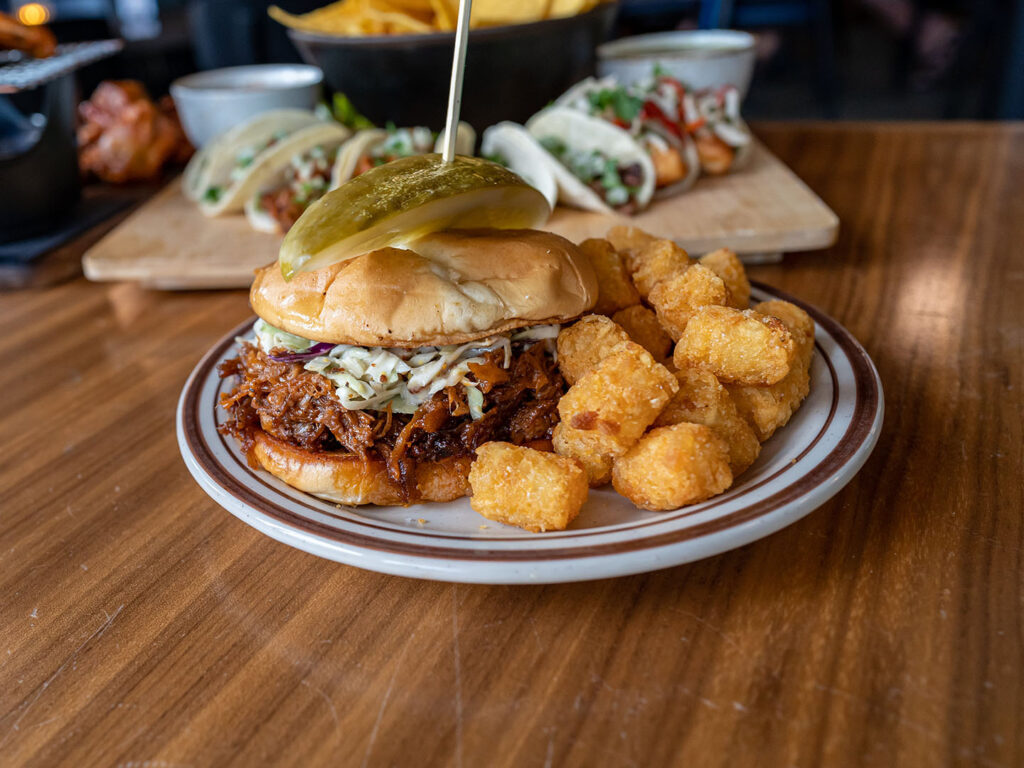 Flanker Kitchen - pulled pork sandwich with tater tots