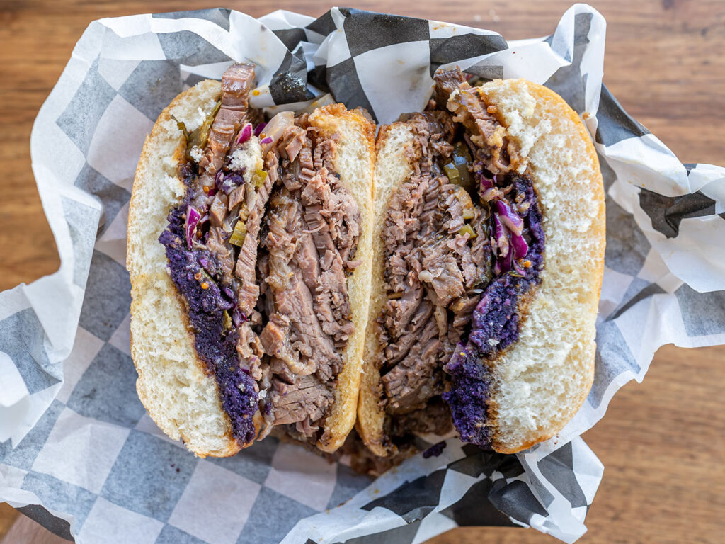 Hog & Tradition - stacked brisket sandwich up close